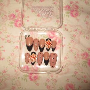 Stylish Nude and Black Press-On Nails